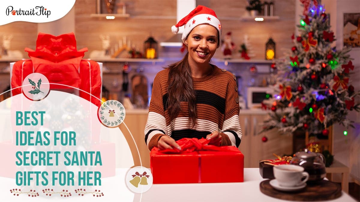 A girl opening her Christmas gift in front of a Christmas tree and wearing a red hat and smiling brightly.   
The image also suggests that below content is about best ideas for secret santa gifts for women. 