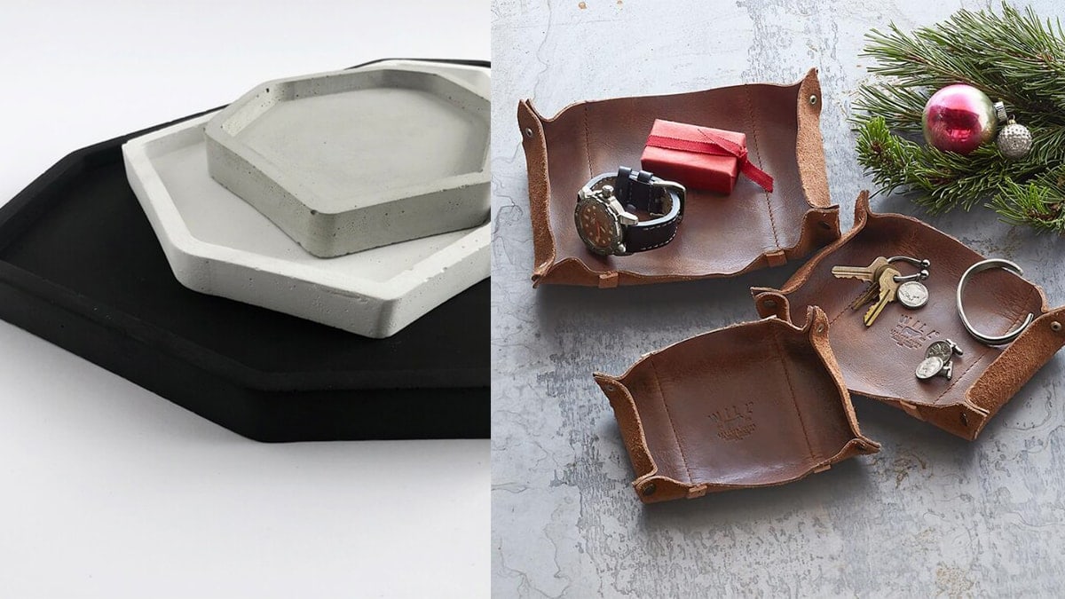 On left: black, and white catachall trays. On right, brown catchall trays with keys, timepiece, and a Christmas gift.