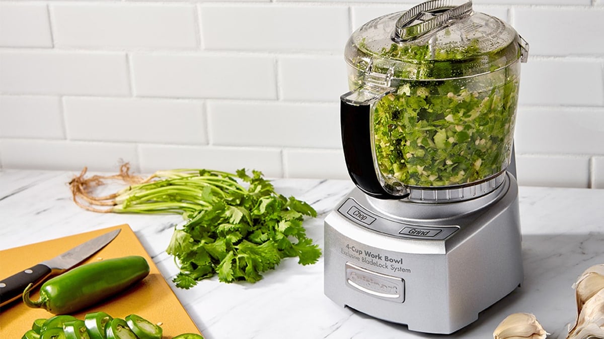 a food processor on the kitchen counter.