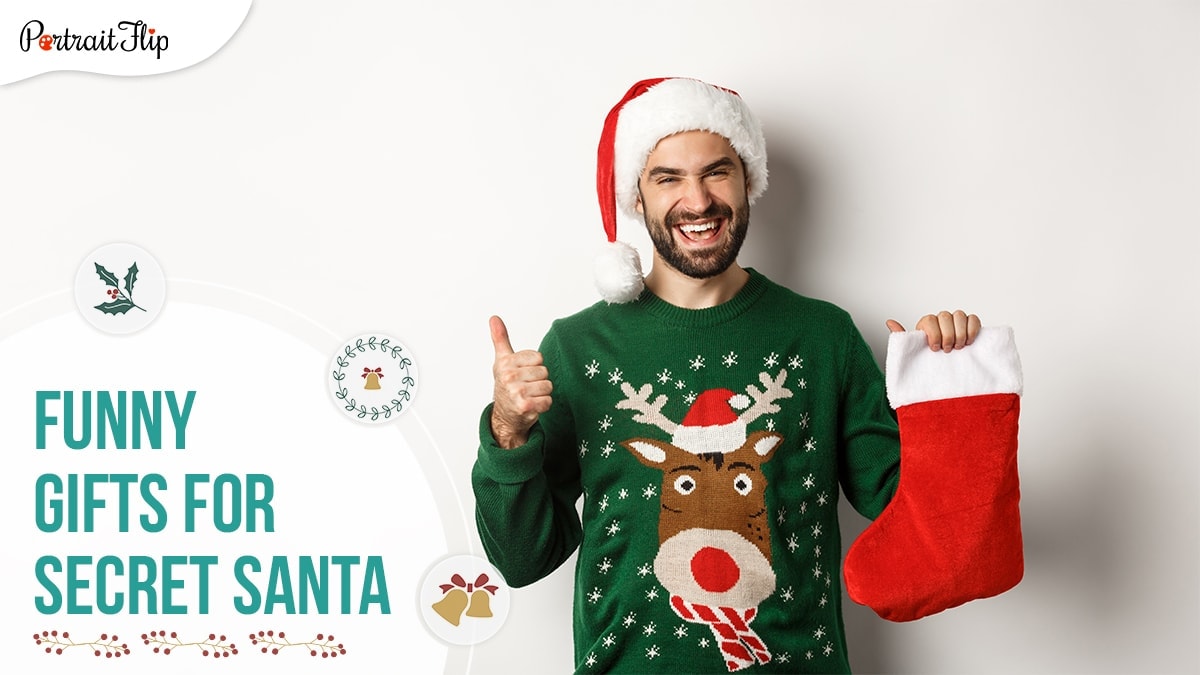 a smiling guy holding a Christmas stockings and smiling .
the image suggests funny gifts for secret santa. 