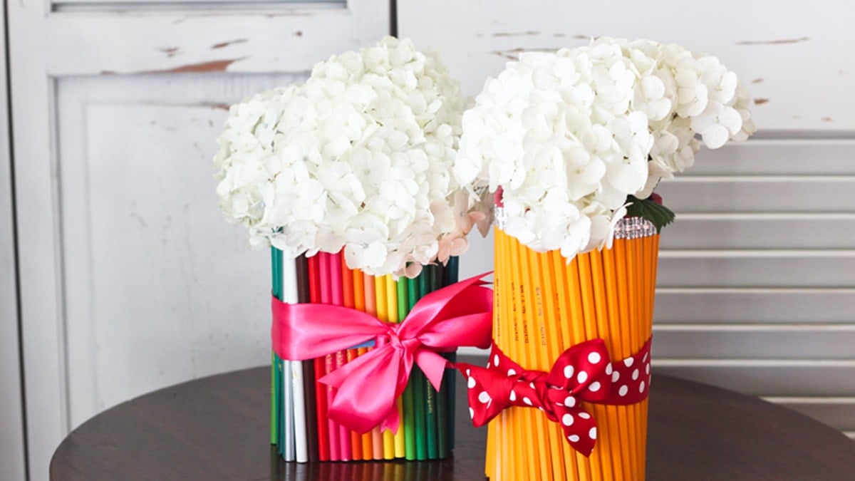 2 homemade Pencil Vases with beautiful white flowers 