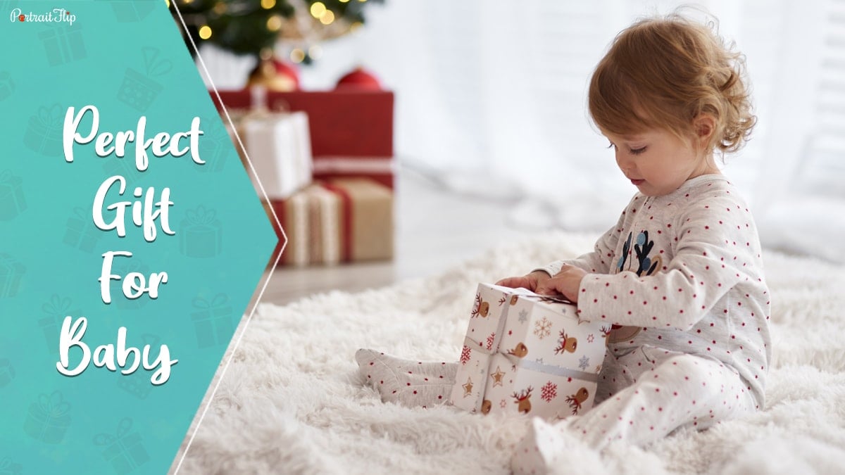 Perfect gifts for baby: a baby opening a gift. 
