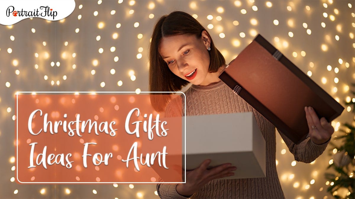 christmas gifts for Aunt: a woman opening her christmas gift on christmas eve