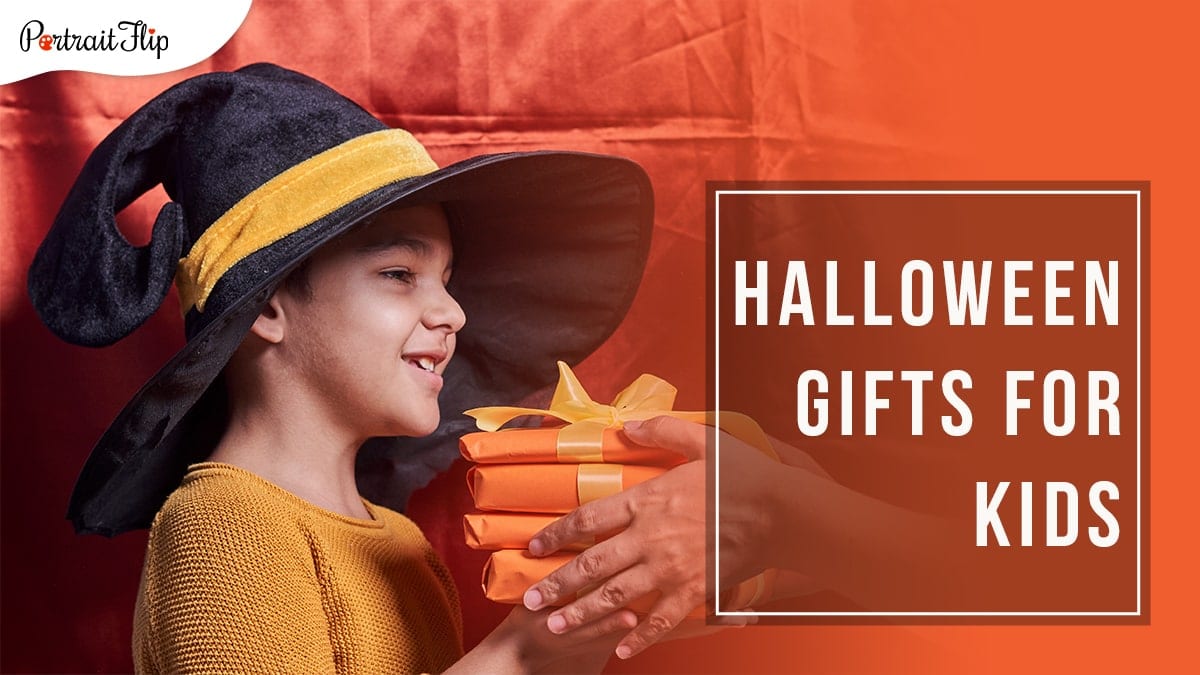 A orange satin backdrop with a kid in a black hat with yellow stripe accepting orange wrapped halloween gifts with yellow ribbons with Halloween Gifts for Kids written in a block on the right hand side