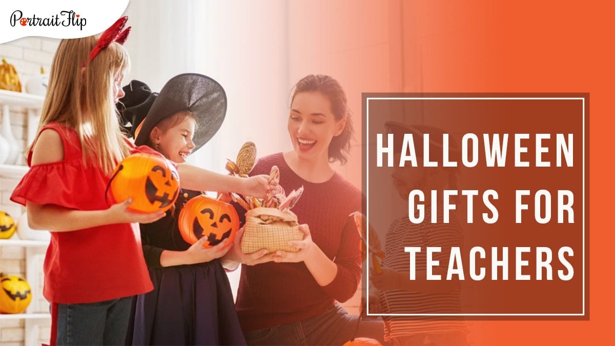 3 children collecting candied lollipops from the teacher's basket, which he is distributing while kneeling in front of a wall decorated with halloween pumpkins with Halloween Gifts for Teachers written in a box on the right hand side