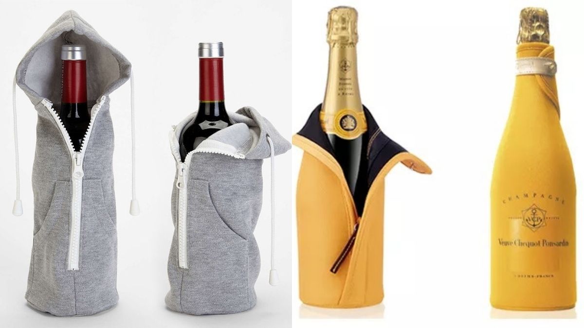 two delicious bottles of wine covered in the bag are placed on a plain and white surface. 