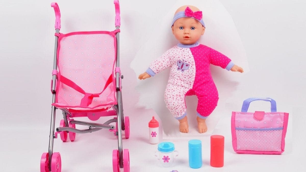 a baby toy set with different toys, stroller, and a baby toy. 