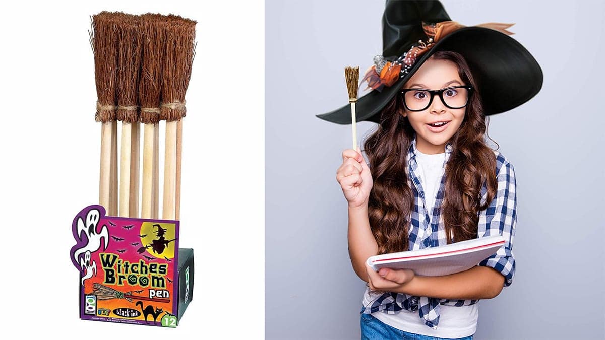 Witches broom shaped pens on a stand on the left and a little girl wearing a witches hat, holding a book and the witch's broom pen in her hand on the right side.
