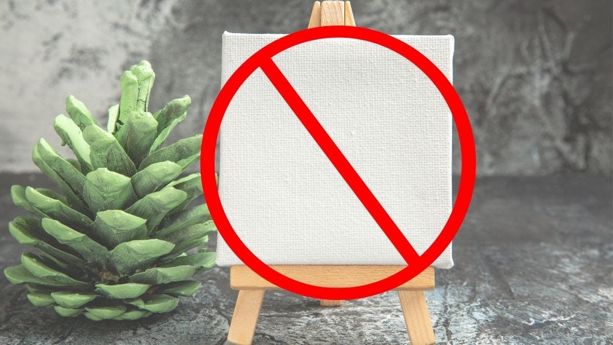 watercolor painting tips: A warning sign on a canvas which implies that never you should never use canvas for watercolor painting. 