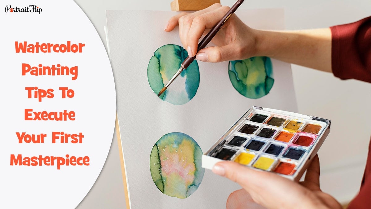 Watercolor Painting Tips : A person painting beautiful spheres on a watercolor paper while holding watercolor cakes in one hand. 