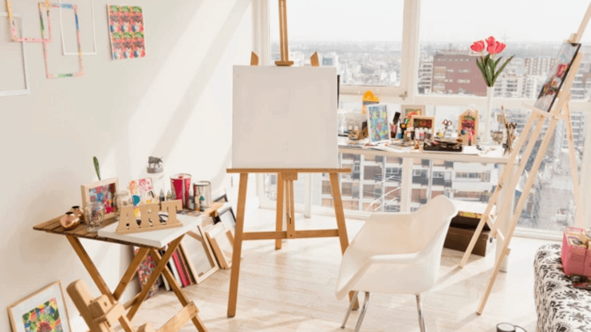 A painting room with canvas, easels, paints and all other painting supplies. 