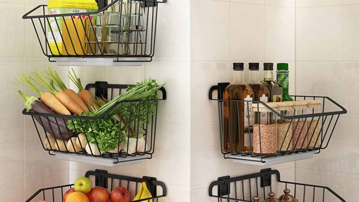 Farmer baskets is hanged on the front and side walls of a kitchen. 