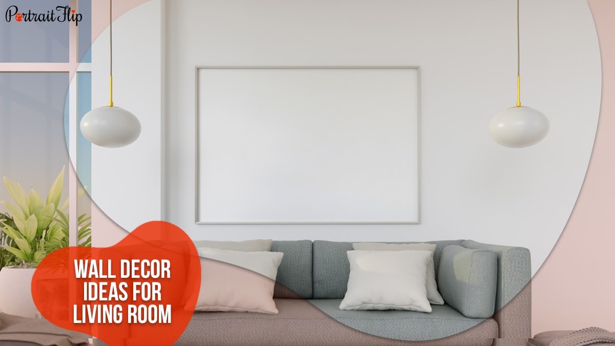 Wall Decor Ideas For Living Room: Empty living room has a sofa, pillows, and white colored lamps. 
