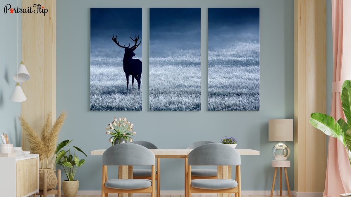 A triptych painting hanging on the wall and giving a pleasant look to the home decor