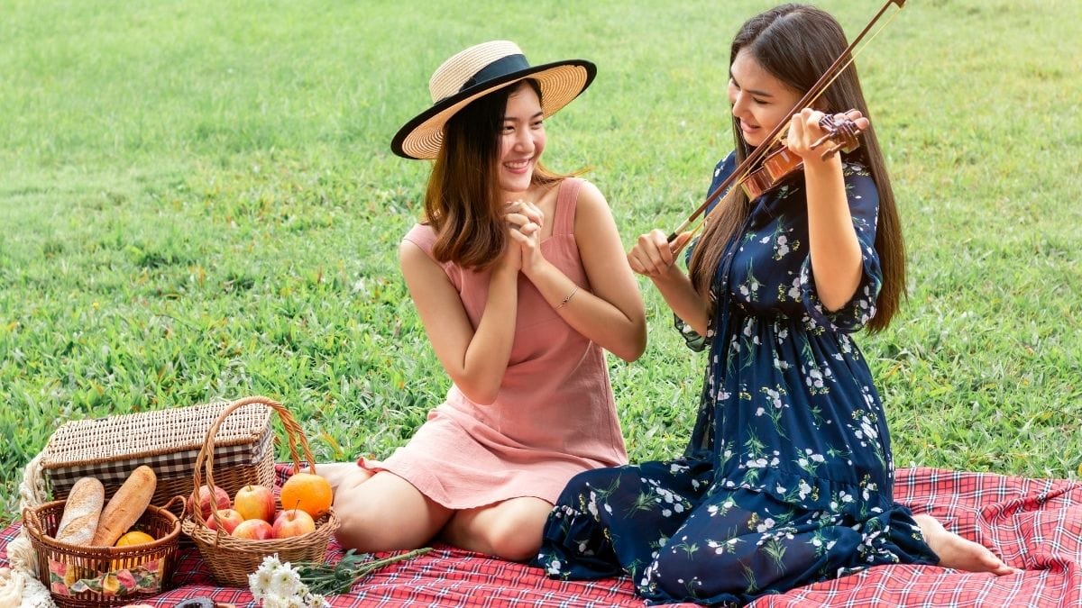 A young lesbian couple on a picnic to spend some quality time together on valentines day. 