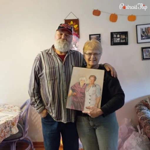 old couple with their watercolor painting