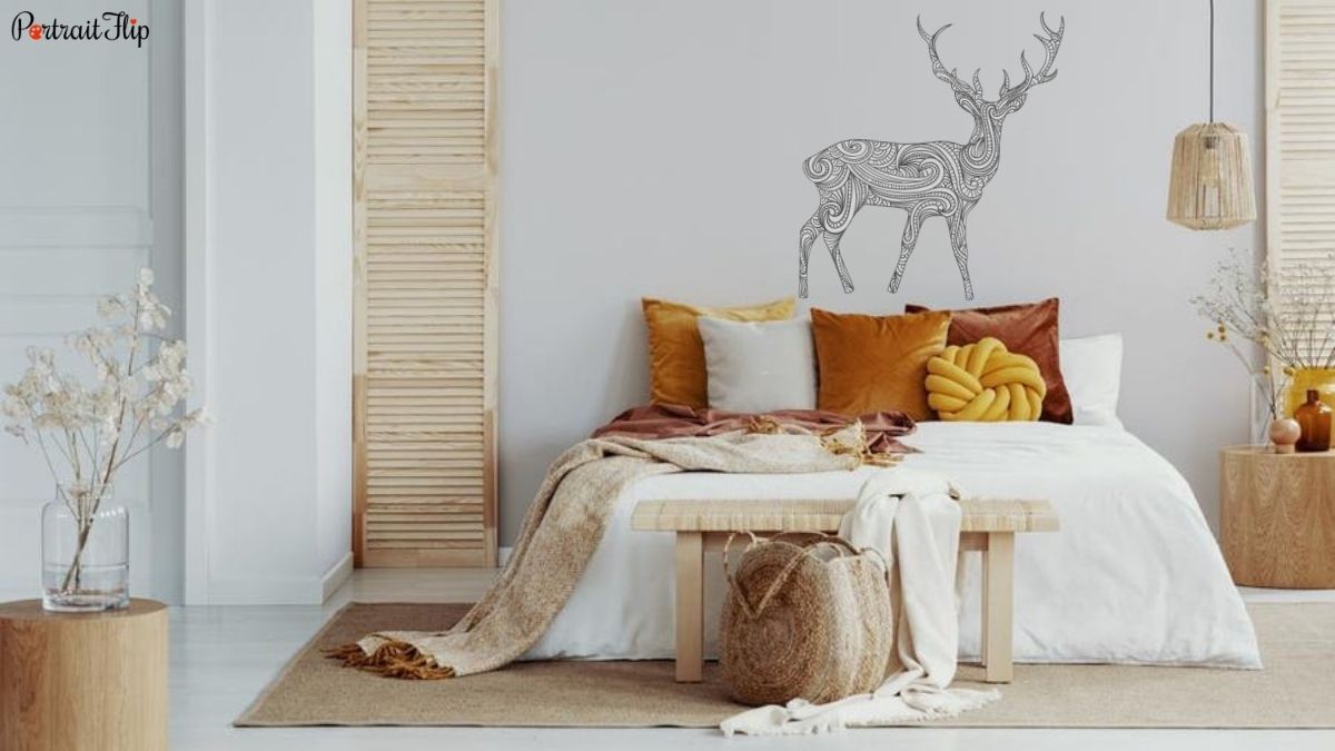 A wall with a deer wall decal as one of the ideas for bedroom wall décor.