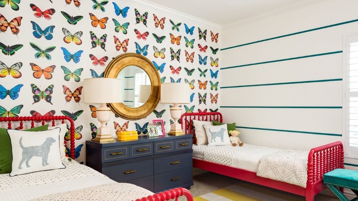 a butterfly wallpaper decorated beautifully in a girls bedroom shown as one of the ideas for bedroom wall decor.
