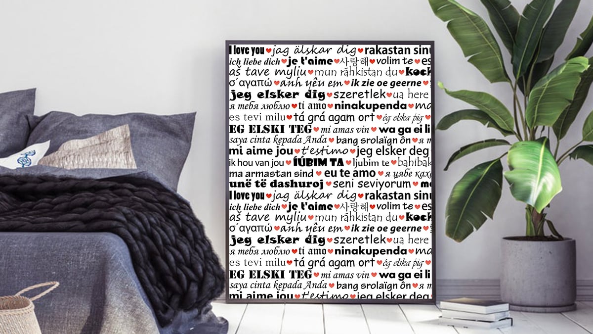 a poster that has "i love you" written in a 100 languages shown as one of the gifts for long distance relationships.