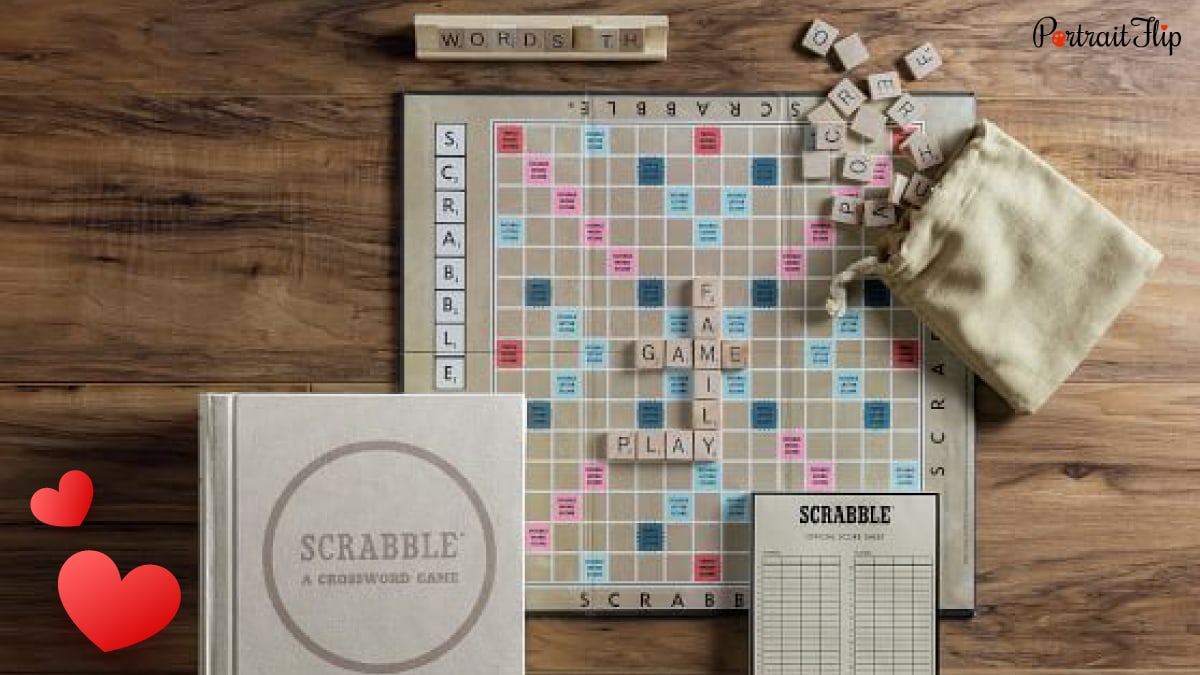 Paper game sets like scrabble  are kept on a table