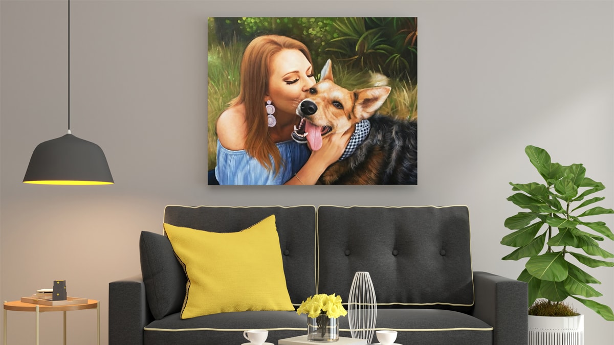 A beautiful interior wall decorated with one of PortraitFlip's customer's kiss portrait of a woman kissing her service dog.