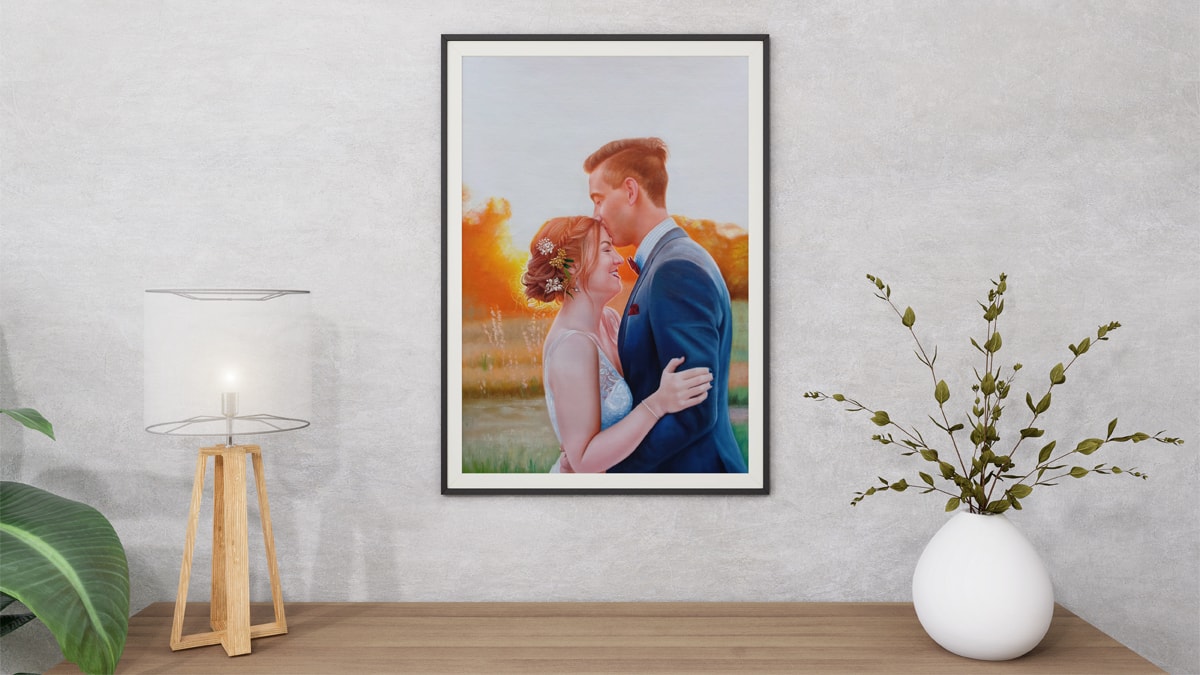 A beautiful interior wall decorated with one of PortraitFlip's customer's kiss portrait of a man kissing a woman on her forehead on their wedding day.