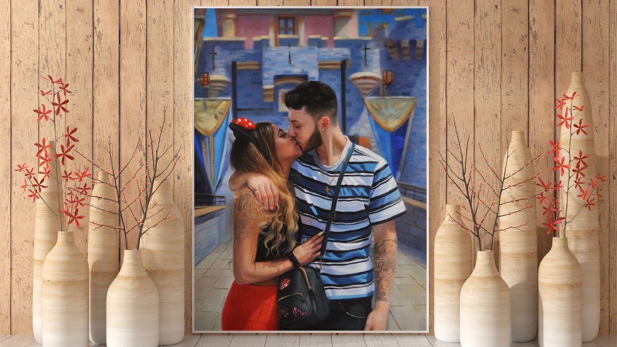 A beautiful interior wall decorated with one of PortraitFlip's customer's kiss portrait of a couple kissing each other in Disneyland.