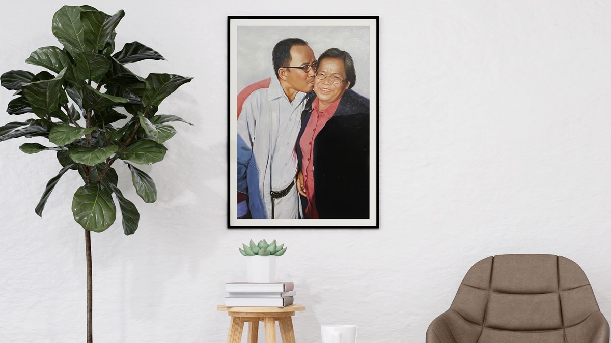 A beautiful interior wall decorated with one of PortraitFlip's customer's kiss portrait of a customer's parents kissing each other.
