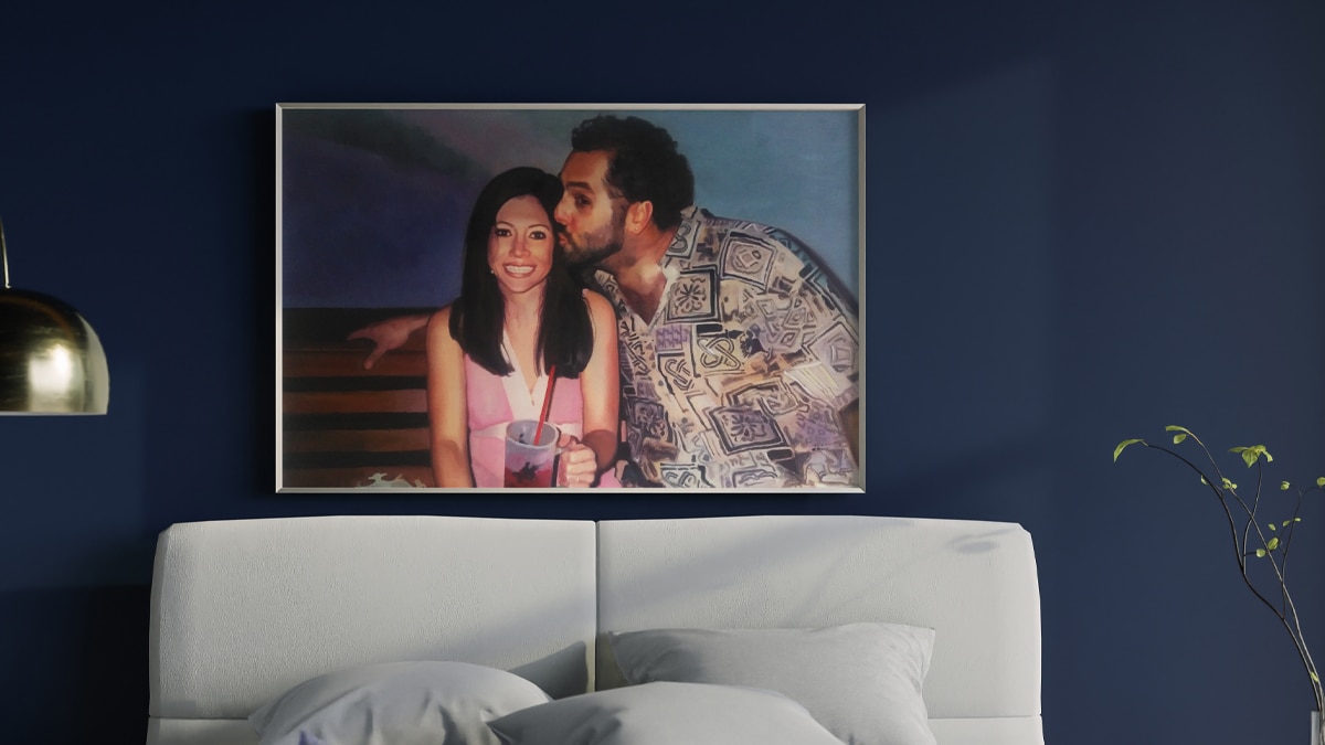 A beautiful interior wall decorated with one of PortraitFlip's customer's kiss portrait of a couple where the guy is kissing the girl on her head.