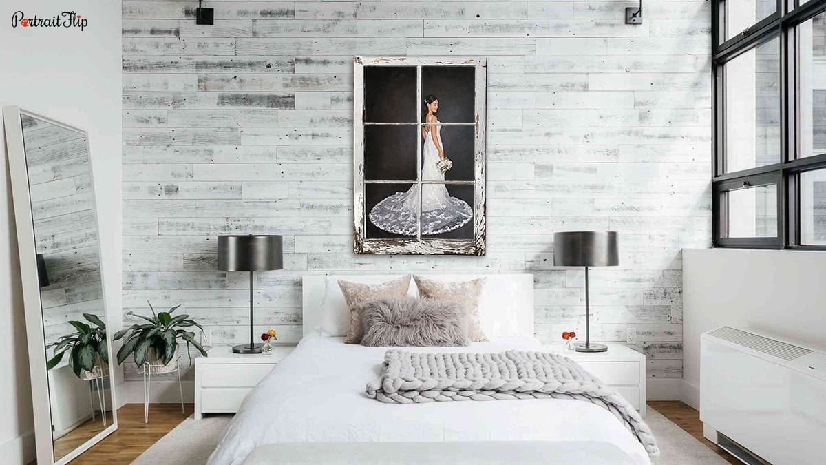 a bedroom wall decorated with a beautiful handmade painting that is framed with a reused window pane shown as one of the ideas for bedroom wall décor.