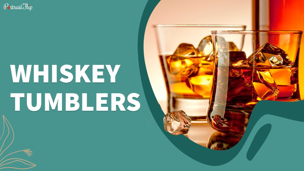 Two whiskey tumblers with ice cubes and whiskey in them