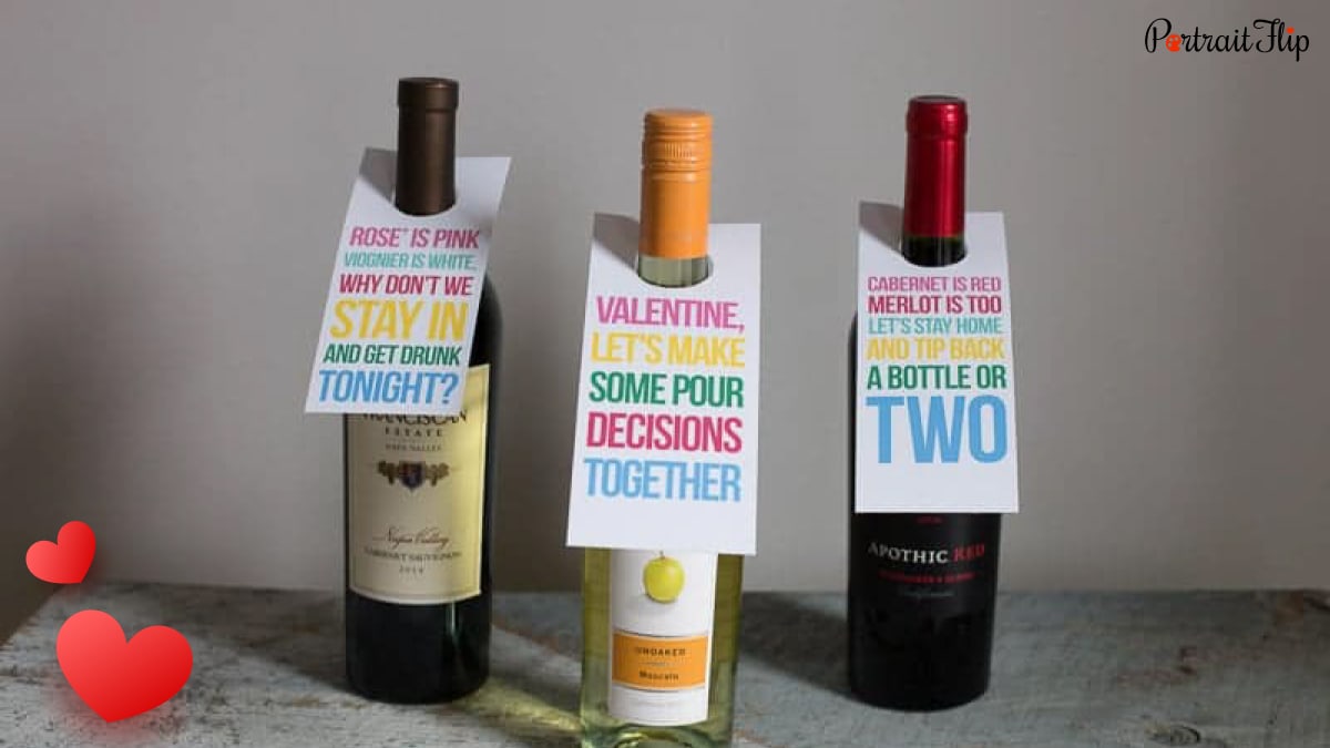 3 wine bottles with wine labels 