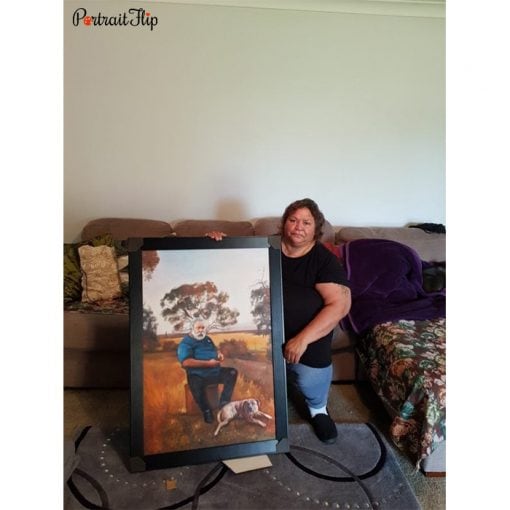 happy lady with her oil painting