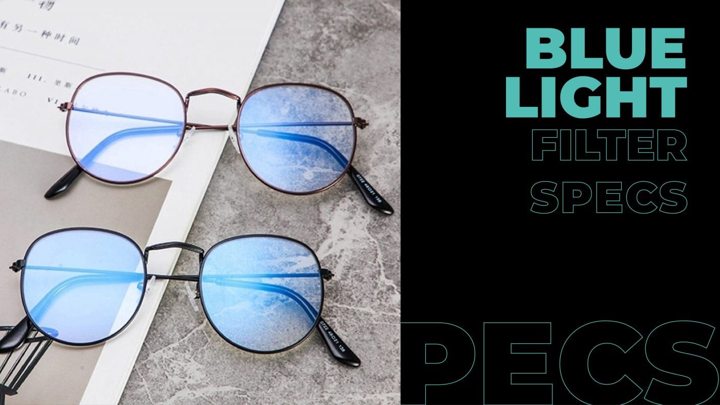 two blue light filter specs on desk.