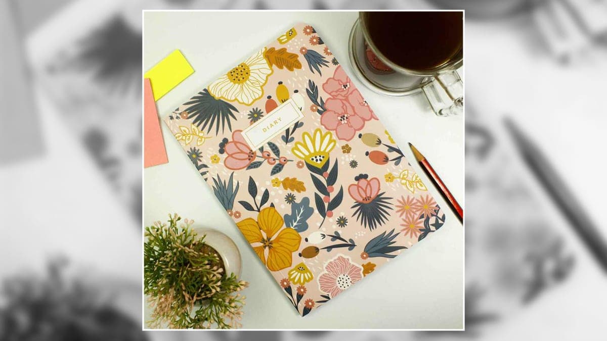 Floral diary on a table. 