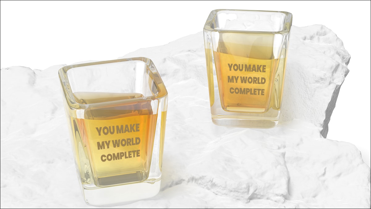two glasses with text 'you make my world complete" written on it. 