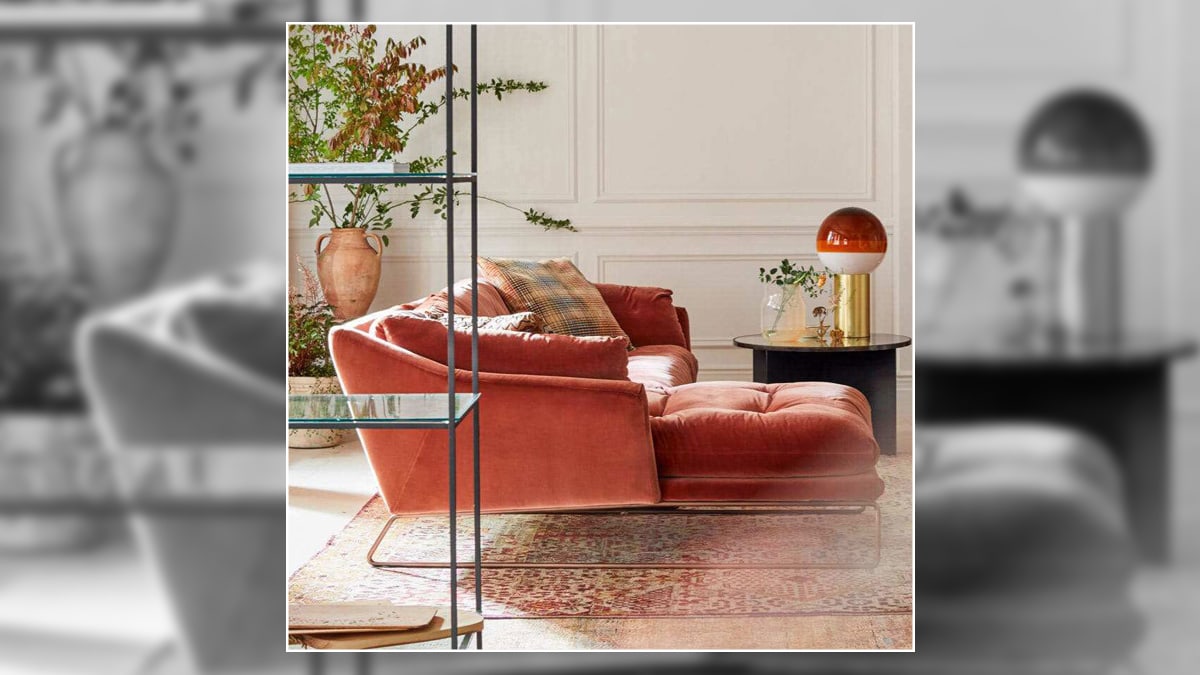a red sofa in the living room