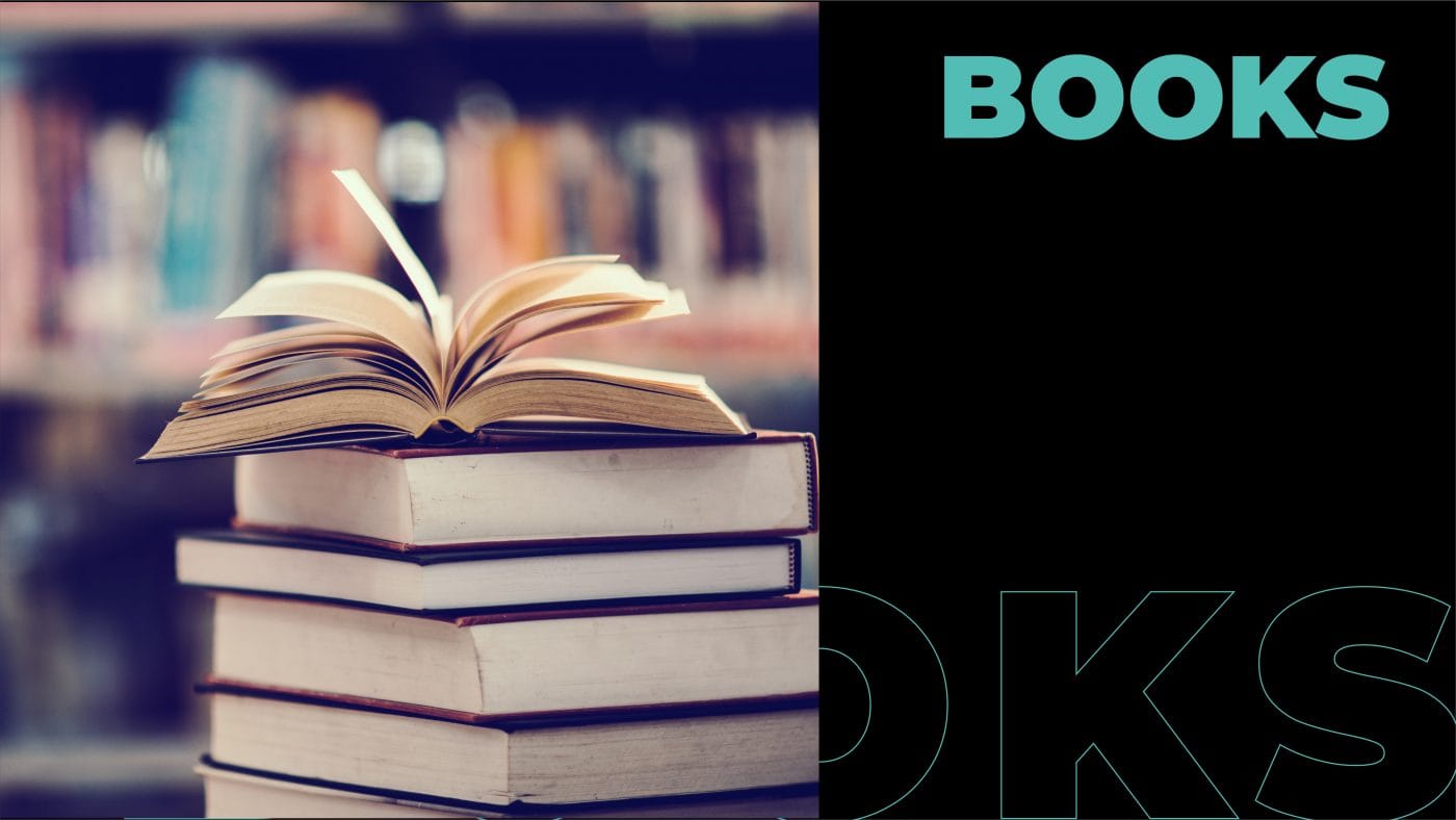 a focused photo of a stack of books in a library.