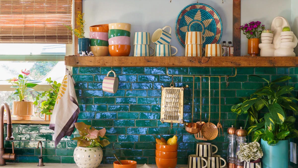 a brightly decorated kitchen counter and shelf. 