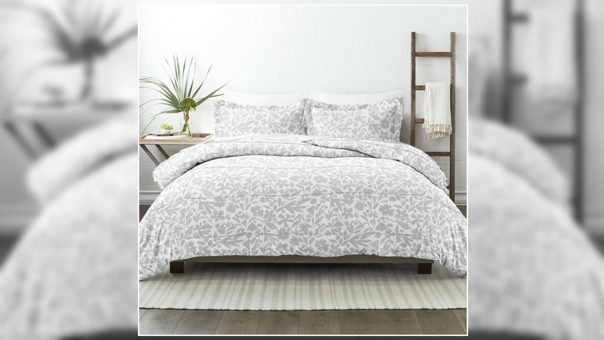 a white and grey bed