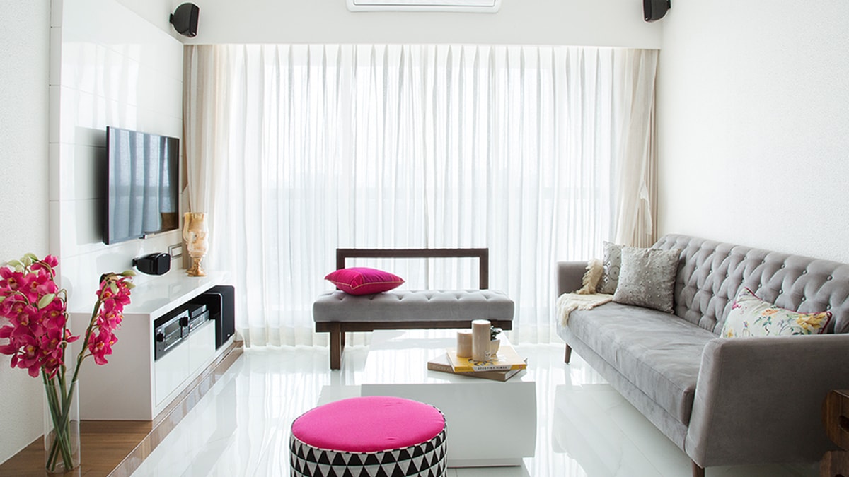 living room decor with neutral shades with pink style. 