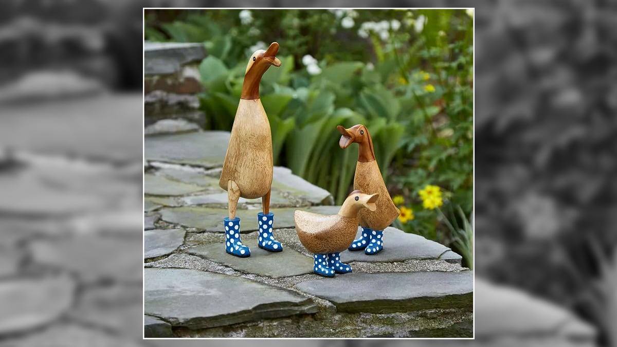 three wooden ducks as decor