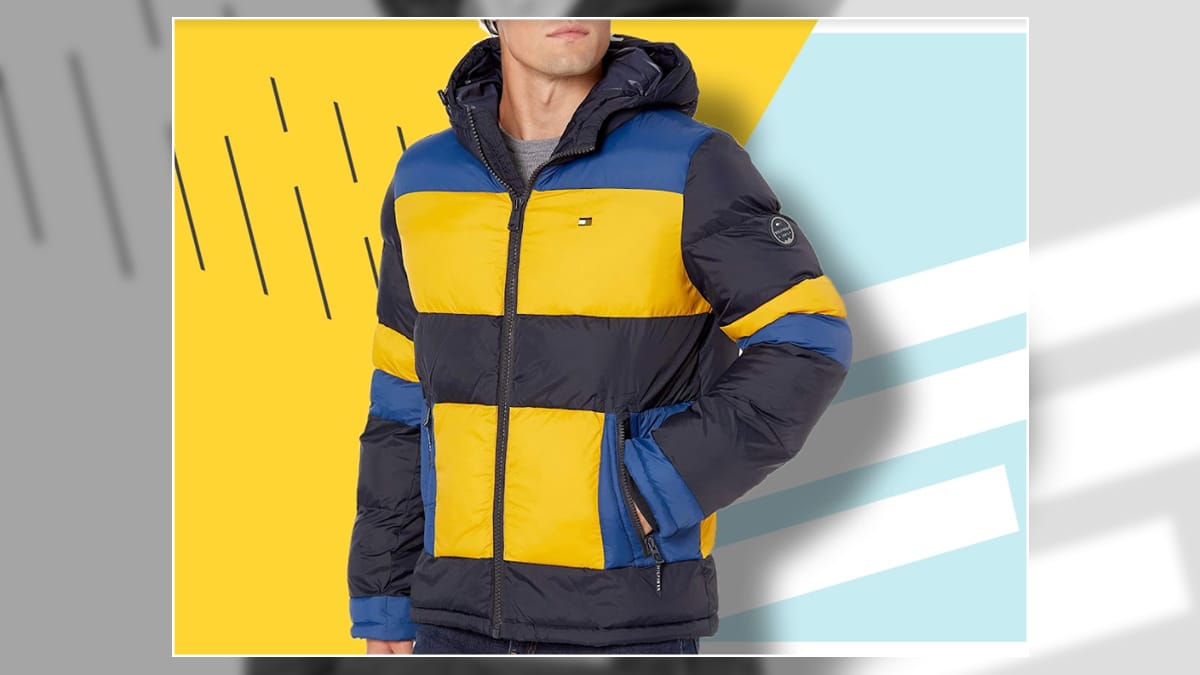 A guy wearing a yellow black and blue jacket. A graduation gift ideas for nephew.