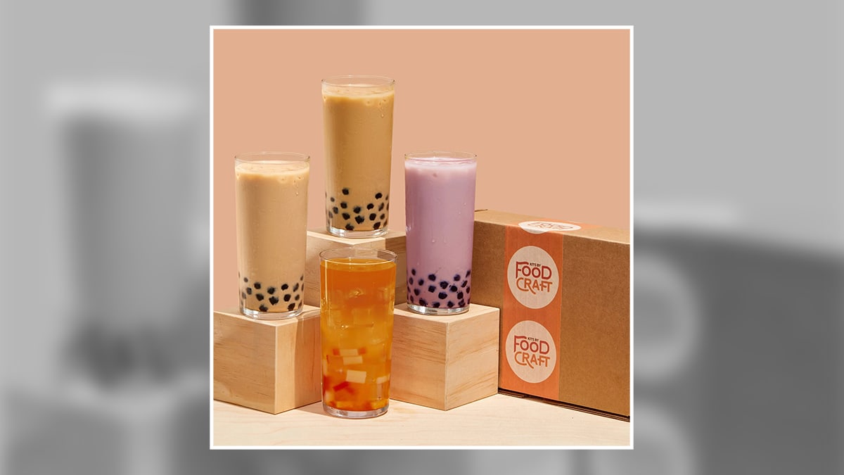 Bubble Tea Kit with 4 glasses filled with bubble tea of different flavors. 