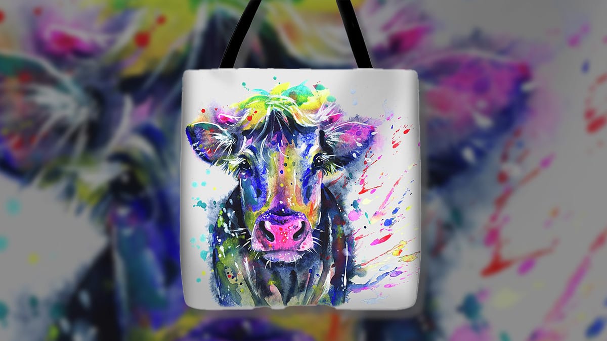 A colorful and playful tote bag with a cow painted on it. Its a gift for pet lovers.