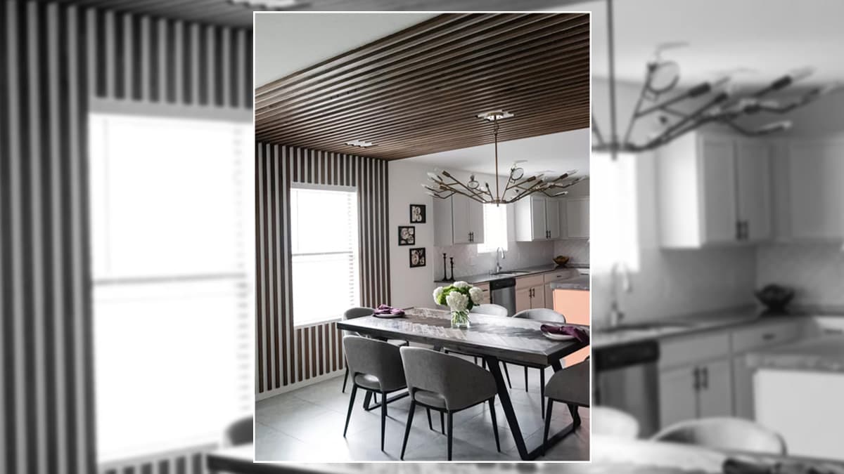 Kitchen interior consists of bold lines on ceilings and side walls. 