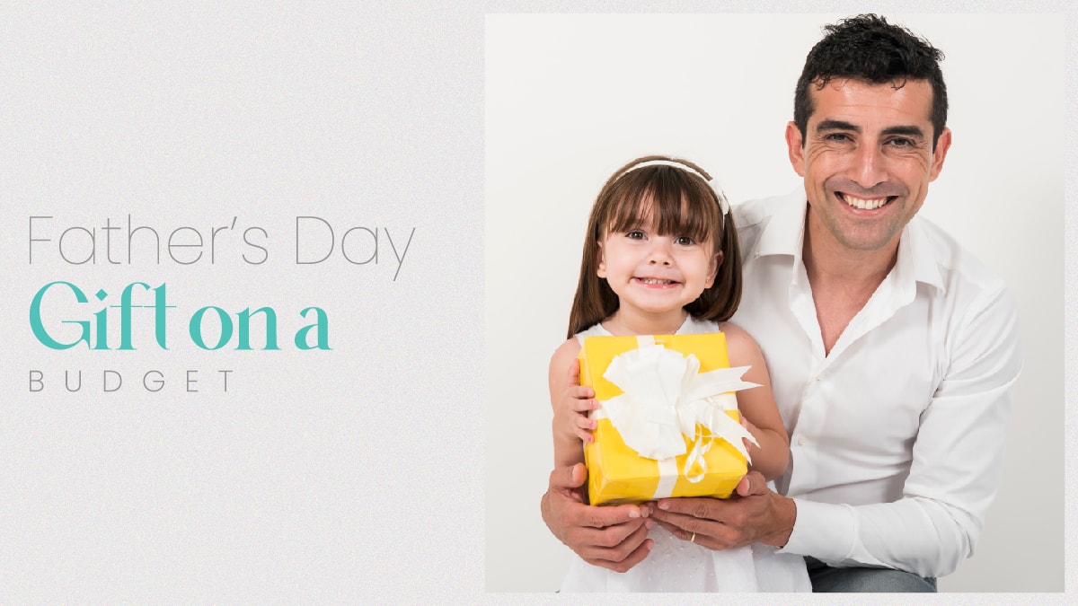A father and daughter with a fathers day gift