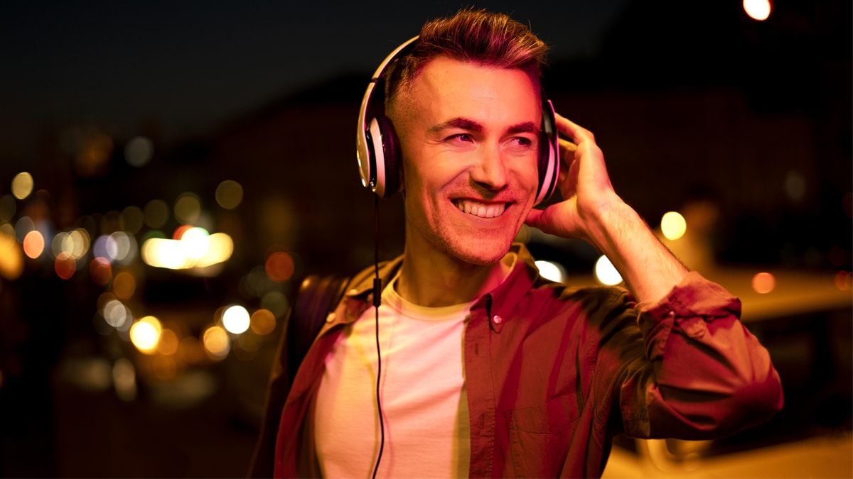 A man with a noise cancelling headphones