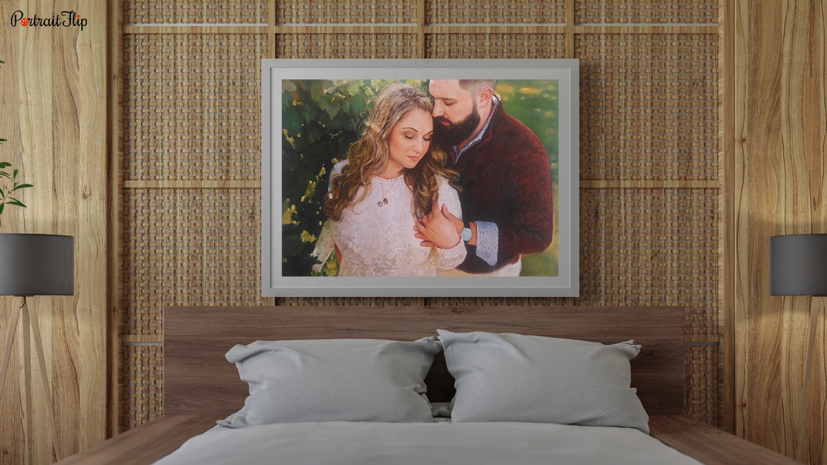A beautiful handmade custom painting hanging on a wall behind the bed. It is a gift for the occasion of a wedding.