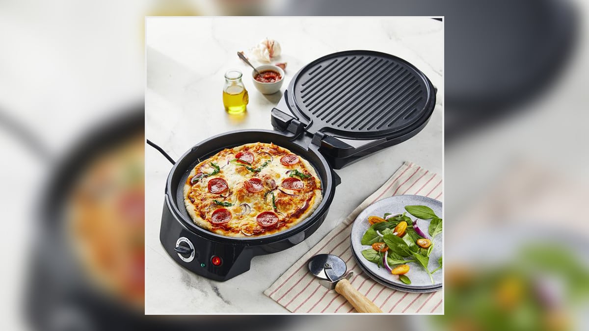 A pizza maker on a table top